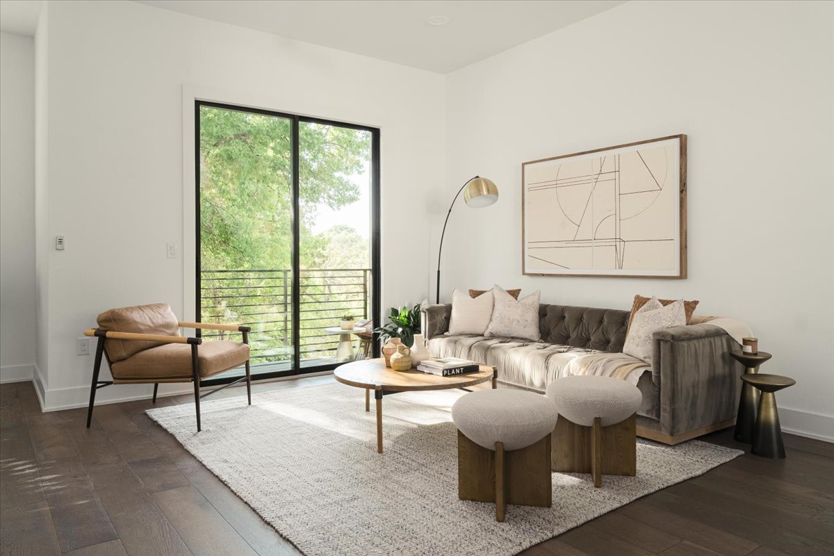 3700 Clawson Road, Unit 301 Austin, TX 78704 - Photo 4 of 35 Living area highlighted by access to balcony overlooking the central park area