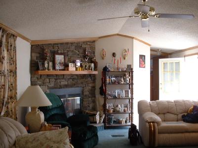 38 Country Club Road West Northampton, PA 18067 - Photo 2 of 5 Living room with stone fireplace for cozy winter evenings at home!
