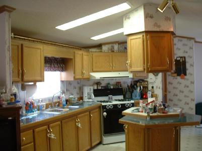 38 Country Club Road West Northampton, PA 18067 - Photo 3 of 5 Open concept center isle kitchen with plenty of cabinets for storage! Gas oven/range, refrigerator remains.