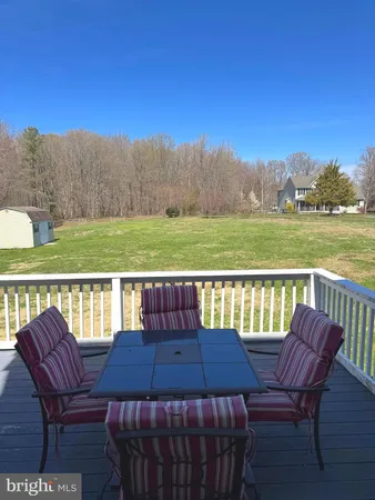 a view of a chairs and table on the terrace