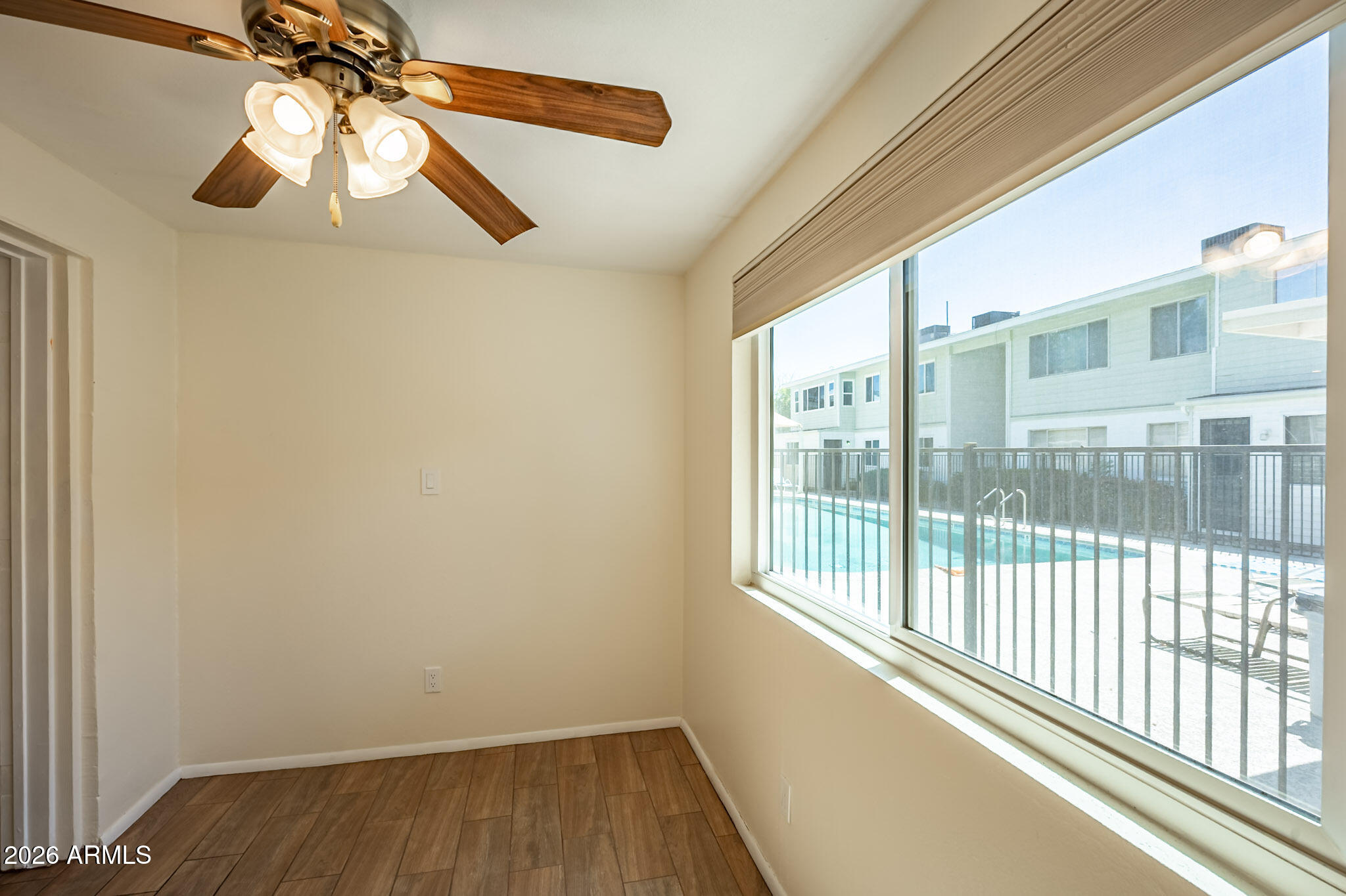 2569 West Berridge Lane, Unit D115 Phoenix, AZ 85017 - Photo 20 of 27 Pool View from Bedroom Area