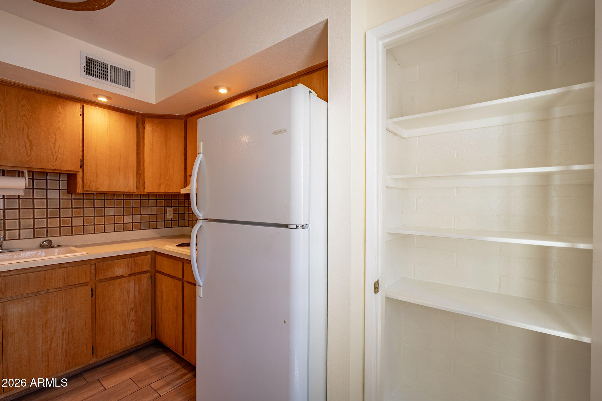 2569 West Berridge Lane, Unit D115 Phoenix, AZ 85017 - Photo 7 of 27 Pantry
