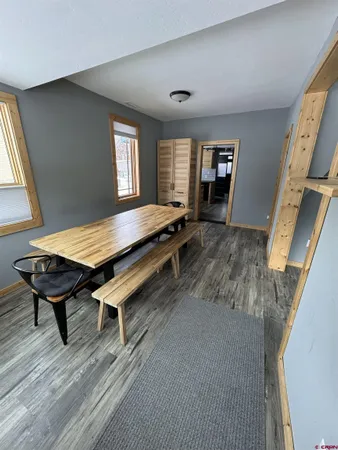 a view of a livingroom with furniture and window