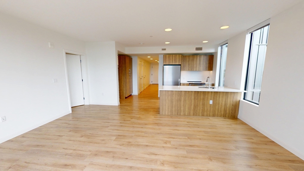 60 Kilmarnock Street, Unit 842 Boston, MA 02215 - Photo 2 of 13 a view of kitchen with wooden floor