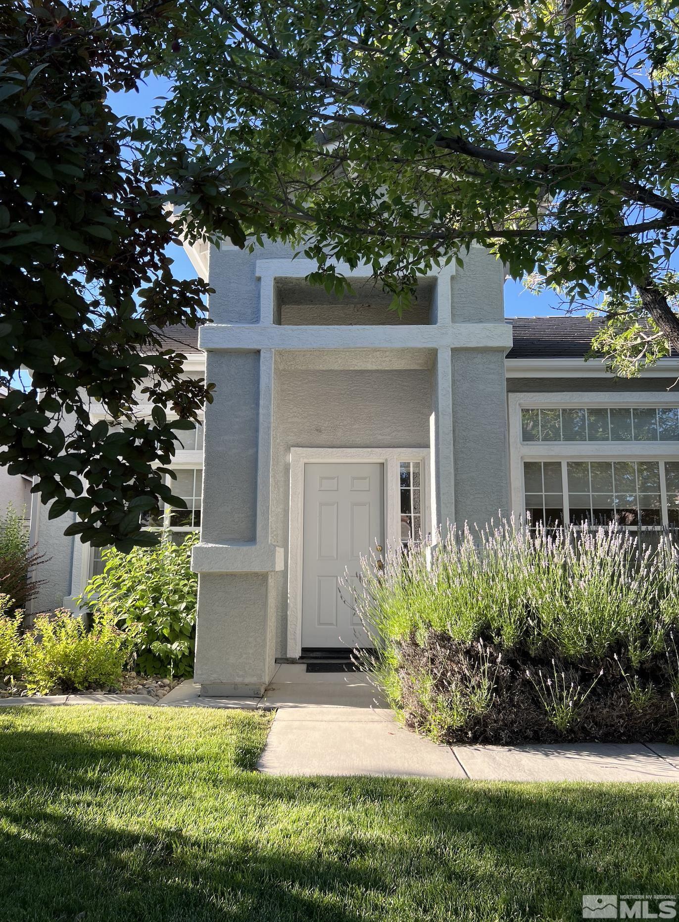 1885 Beringer Way Reno, NV 89521 - Photo 3 of 29 a view of a house with a garden