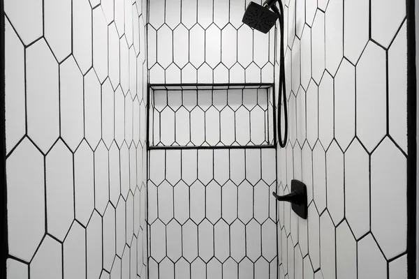 a view of a black white door and chair