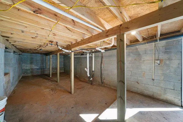 a view of a room with wooden walls