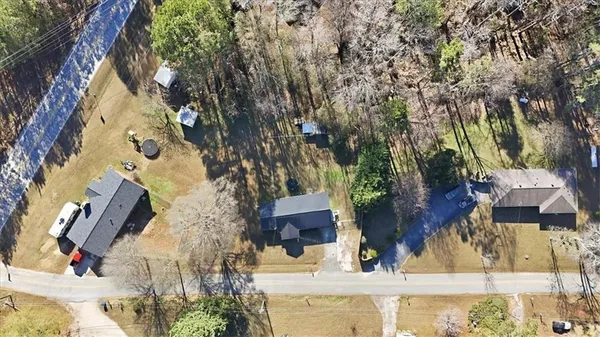 front view of a house with a trees