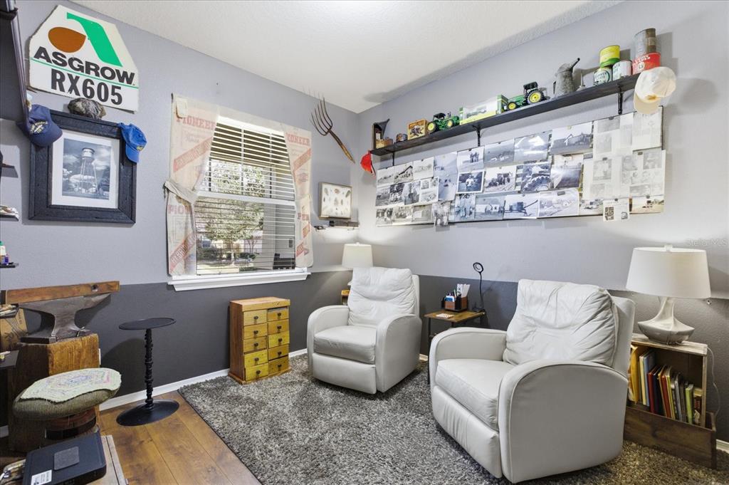 20900 Oldenburg Loop Mount Dora, FL 32757 - Photo 30 of 44 a living room with furniture and a window