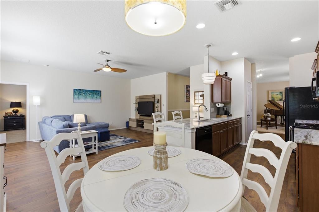 20900 Oldenburg Loop Mount Dora, FL 32757 - Photo 8 of 44 a view of a dining room with furniture