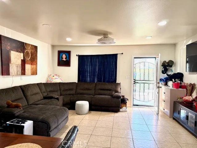 a living room with furniture and a couch