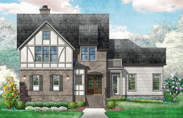 a view of a house with brick walls and a yard with plants