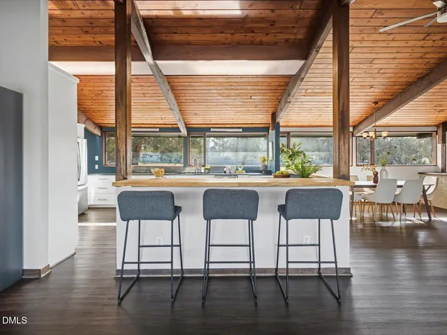 a view of a room with a large window