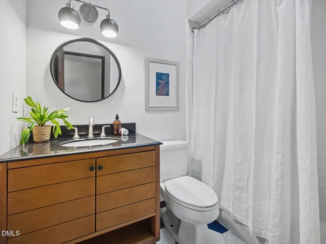 a view of an empty room with a sliding door