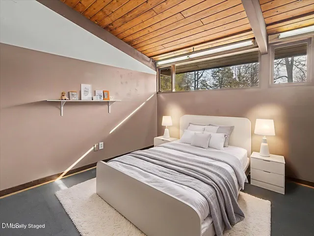 a backyard of a house with seating space