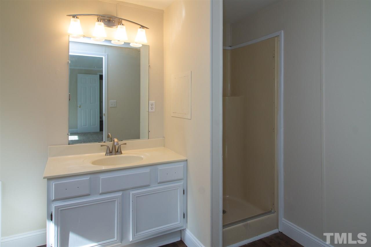 8971 Frank Road Kenly, NC 27542 - Photo 11 of 20 Master bath with new countertops, lighting, plumbing upgrades