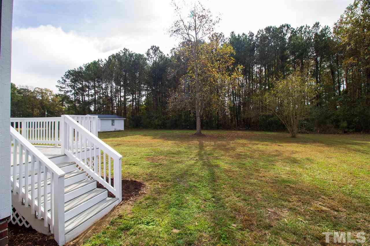 8971 Frank Road Kenly, NC 27542 - Photo 18 of 20 Backyard perfect for entertaining, favorite fur babies to run, or kids playyard.
