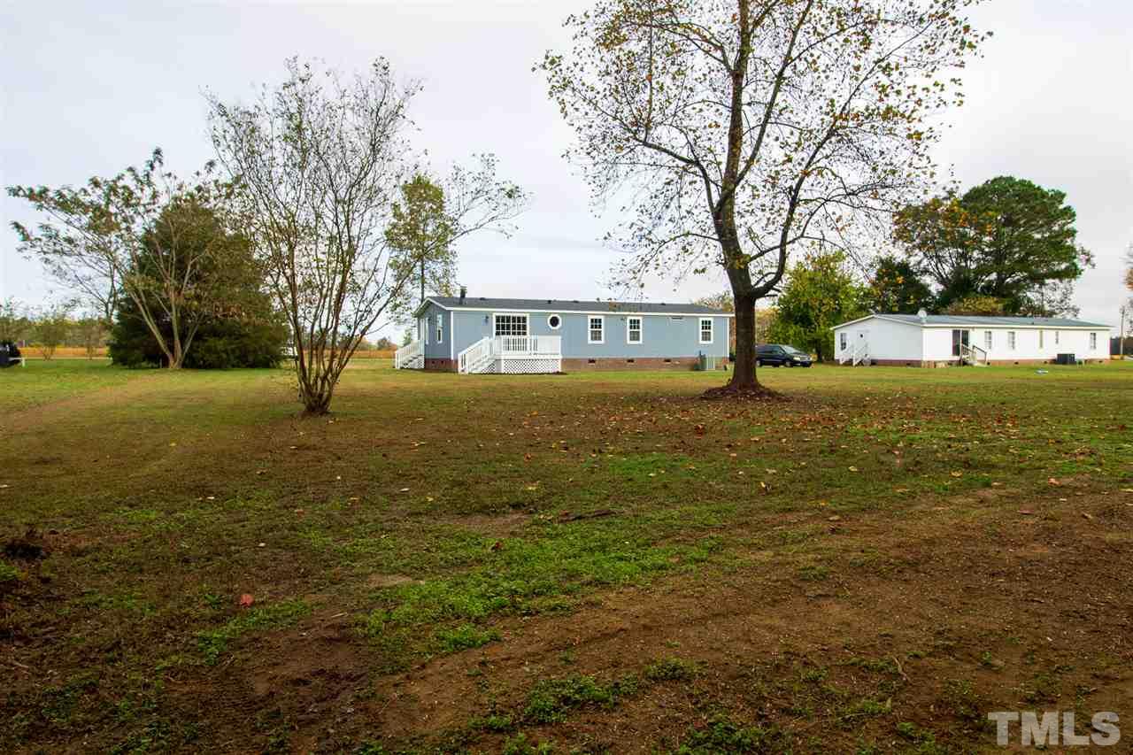 8971 Frank Road Kenly, NC 27542 - Photo 19 of 20 exterior view of back of lot and house