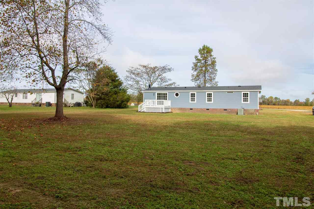 8971 Frank Road Kenly, NC 27542 - Photo 3 of 20 Large backyard with deck