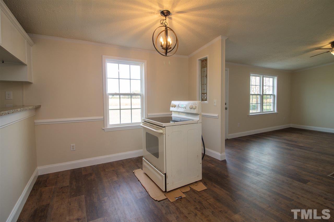 8971 Frank Road Kenly, NC 27542 - Photo 5 of 20 New stove being installed 11-6