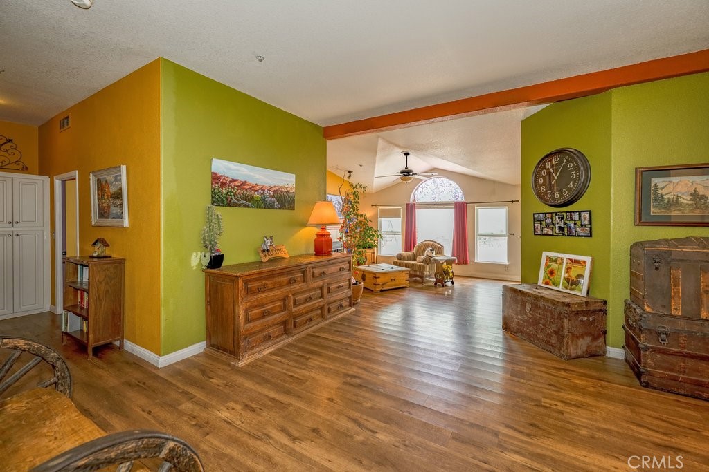 33330 Palen Road Agua Dulce, CA 91390 - Photo 24 of 56 a view of a livingroom with furniture hardwood floor and a flat screen tv