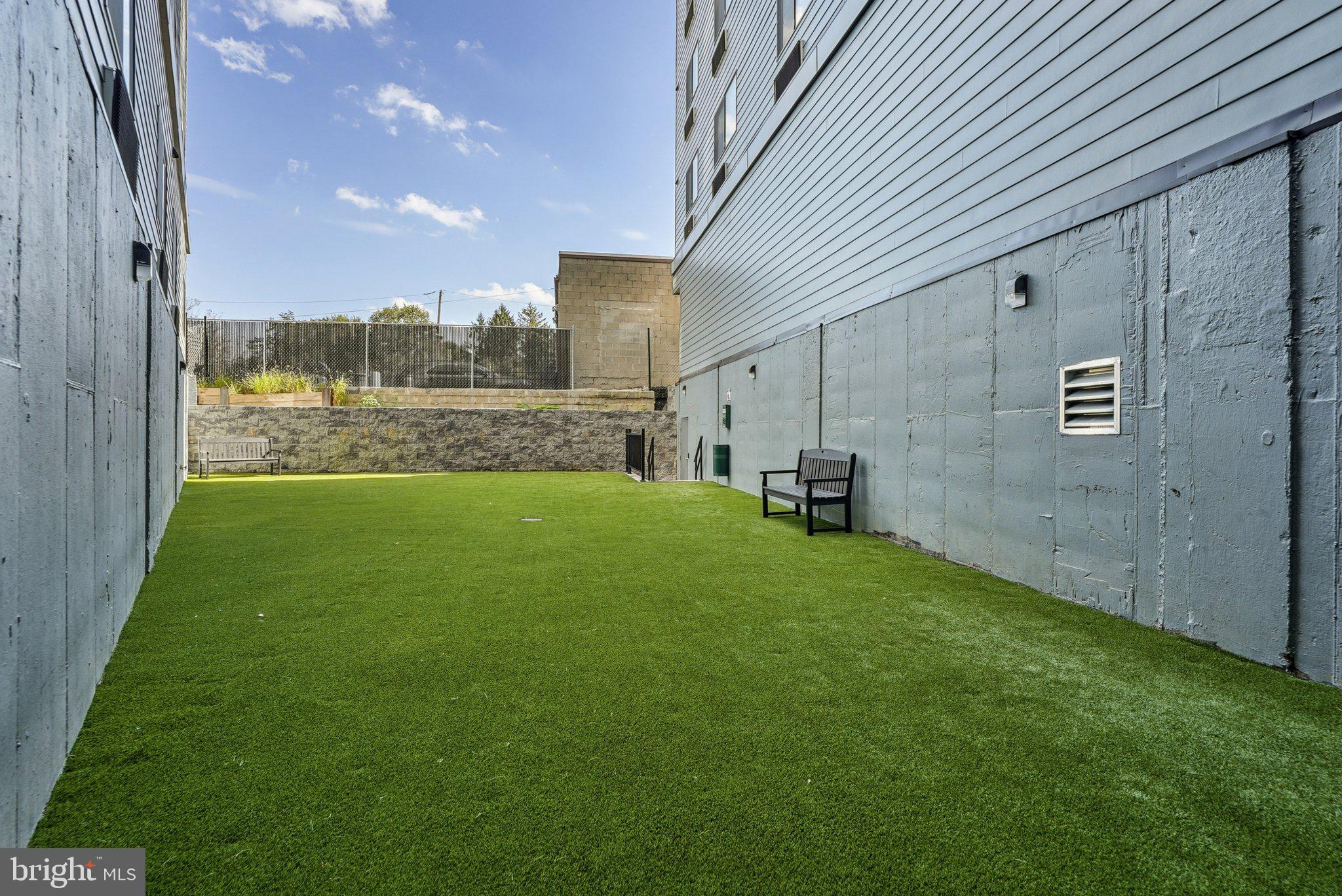 6515 Ridge Avenue, Unit 304 Philadelphia, PA 19128 - Photo 12 of 14 a view of a back yard of the house
