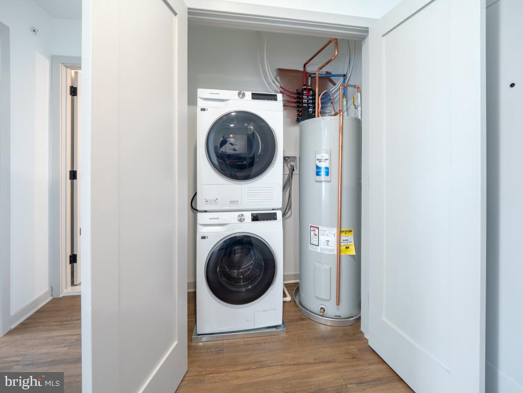 6515 Ridge Avenue, Unit 304 Philadelphia, PA 19128 - Photo 7 of 14 a view of a hallway with washer and dryer