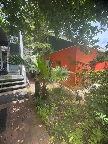 a car parked in front of a house