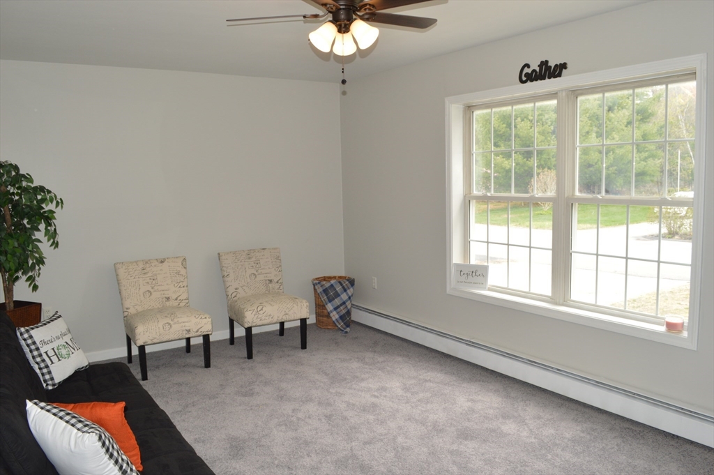 75 Eagle View Drive Douglas, MA 01516 - Photo 11 of 28 a living room with furniture and a window