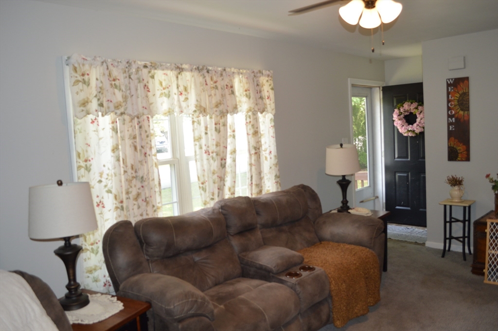 75 Eagle View Drive Douglas, MA 01516 - Photo 14 of 28 a living room with furniture and a window