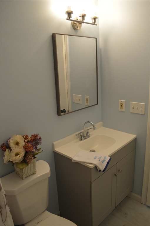 75 Eagle View Drive Douglas, MA 01516 - Photo 15 of 28 a bathroom with a sink toilet and mirror