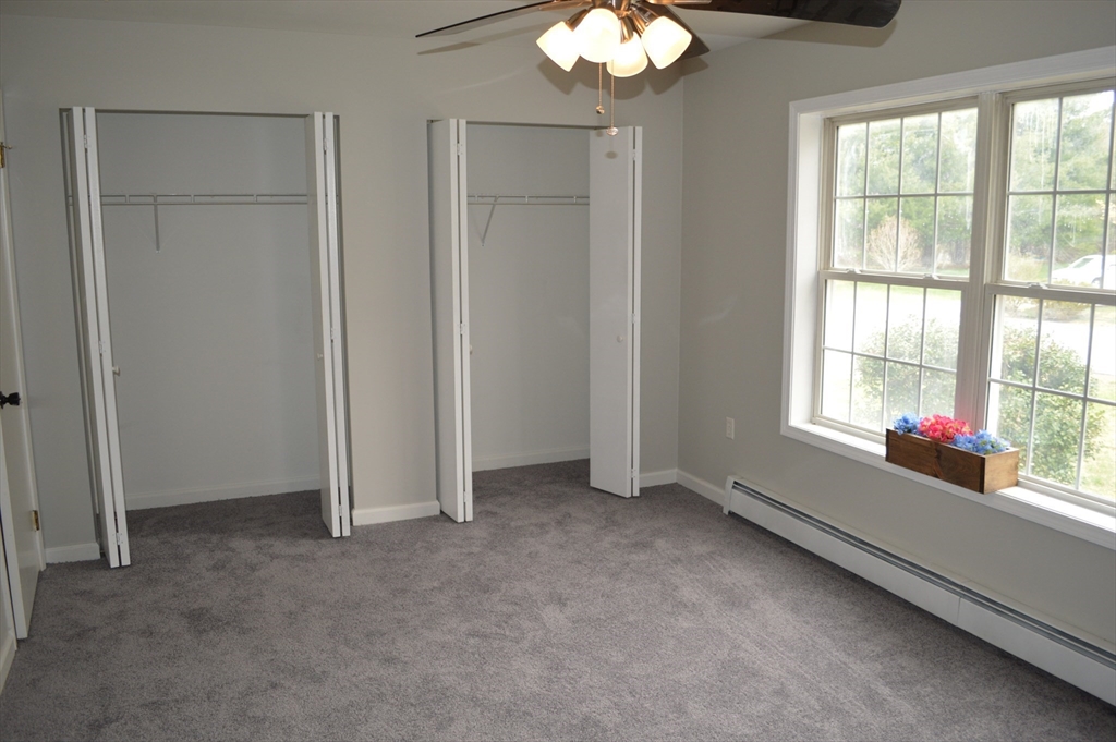 75 Eagle View Drive Douglas, MA 01516 - Photo 17 of 28 a view of an empty room with a window