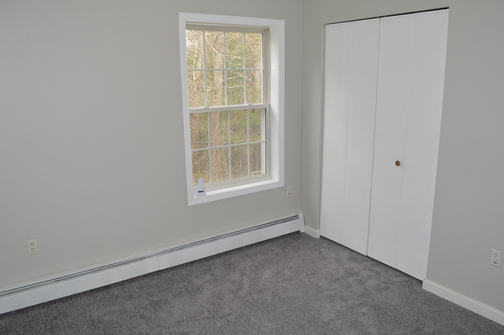 75 Eagle View Drive Douglas, MA 01516 - Photo 19 of 28 an empty room with a window