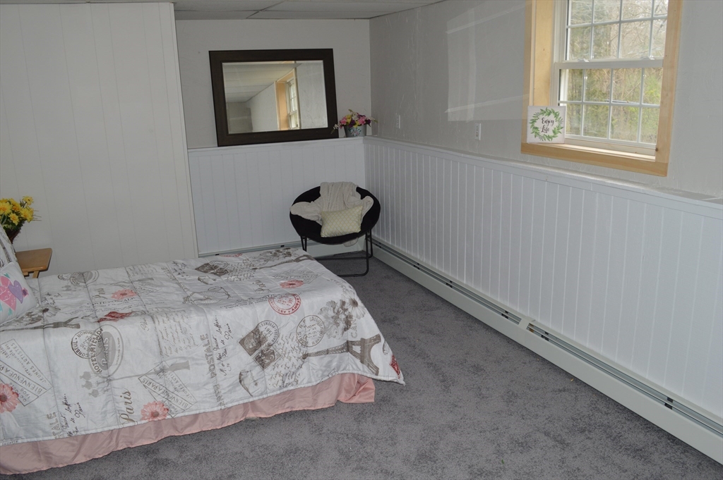 75 Eagle View Drive Douglas, MA 01516 - Photo 21 of 28 a bedroom with a bed and a window