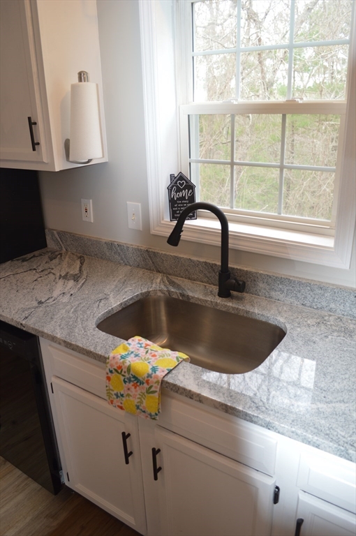 75 Eagle View Drive Douglas, MA 01516 - Photo 6 of 28 a kitchen with a sink and a window