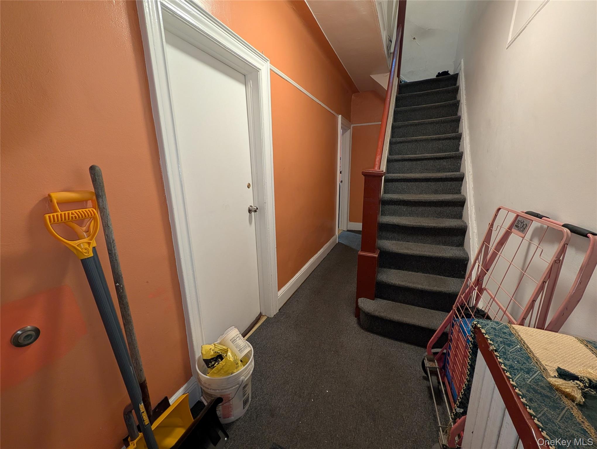90-46 76th Street Queens, NY 11421 - Photo 6 of 32 a view of staircase with wooden floor