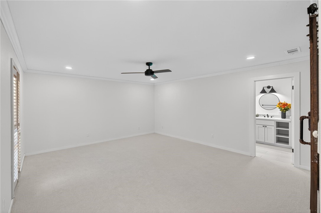 126 Rainbow Lane Corpus Christi, TX 78411 - Photo 21 of 40 wooden floor in an empty room with a window