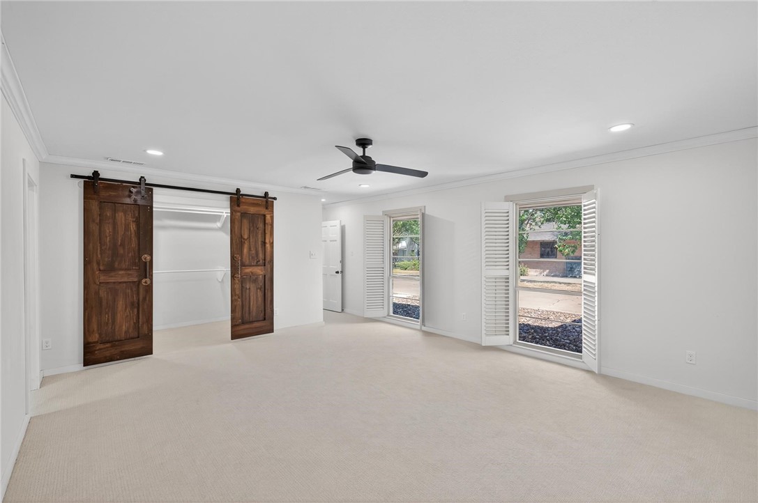 126 Rainbow Lane Corpus Christi, TX 78411 - Photo 23 of 40 a view of an empty room with a window