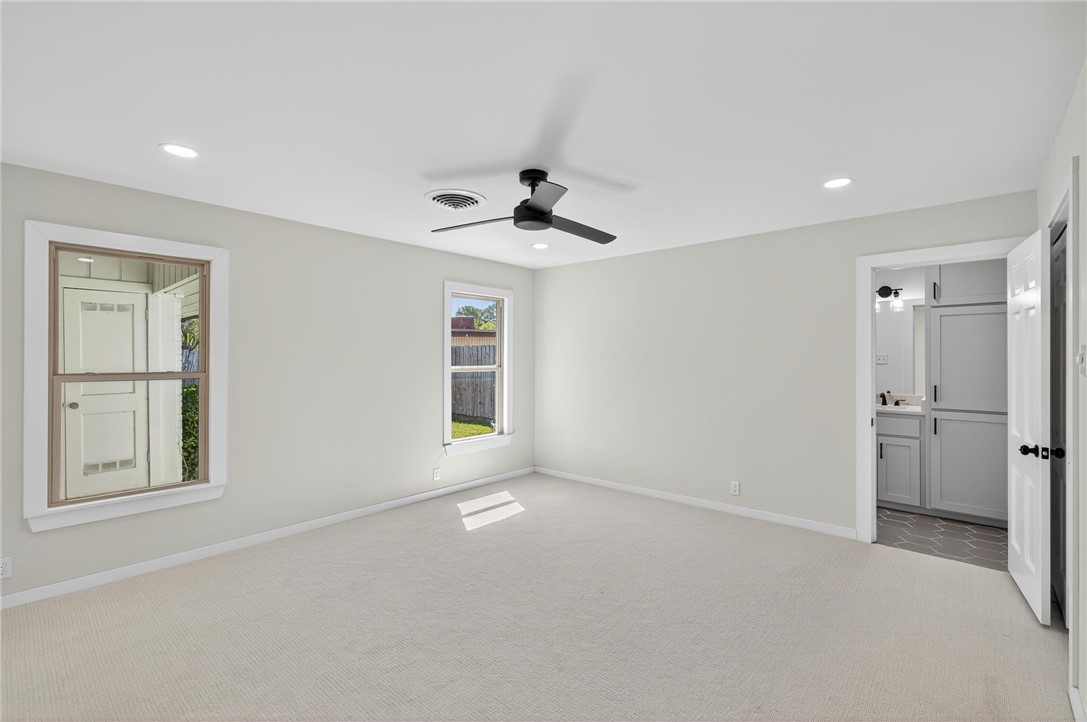 126 Rainbow Lane Corpus Christi, TX 78411 - Photo 27 of 40 a view of an empty room with a window