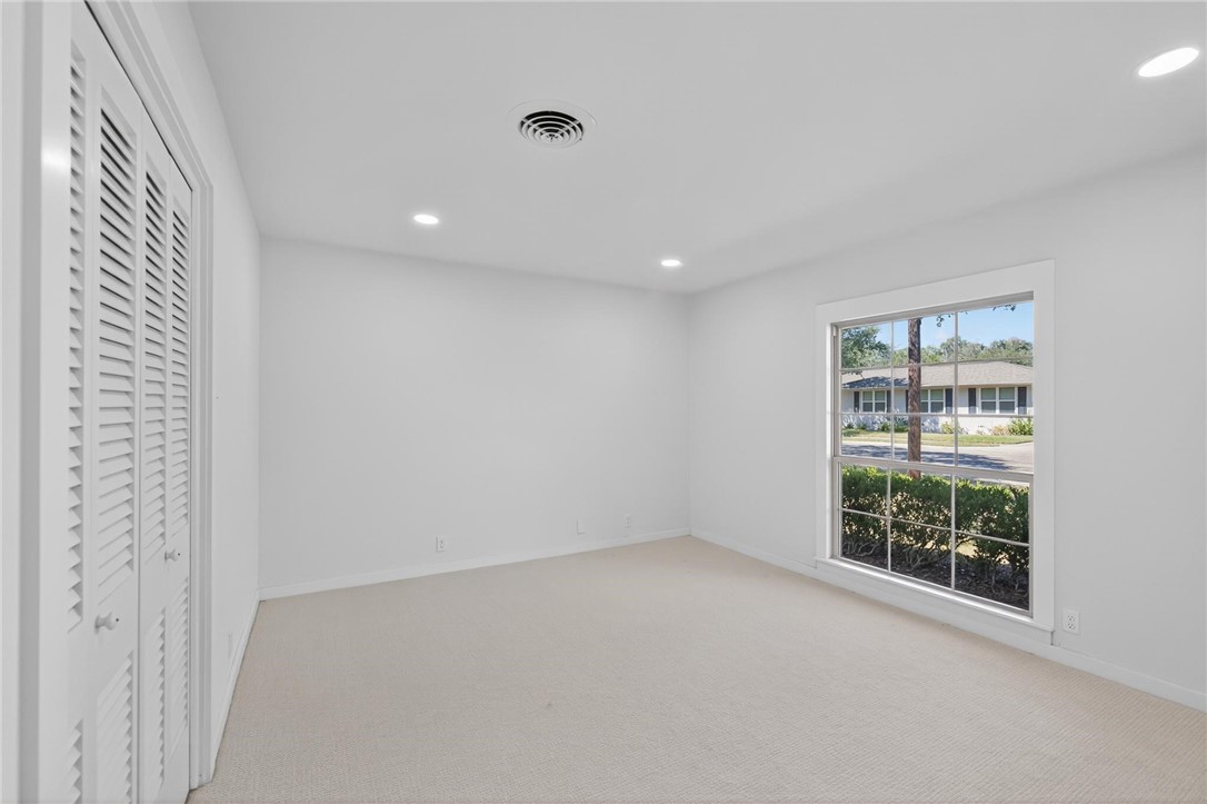 126 Rainbow Lane Corpus Christi, TX 78411 - Photo 31 of 40 an empty room with windows