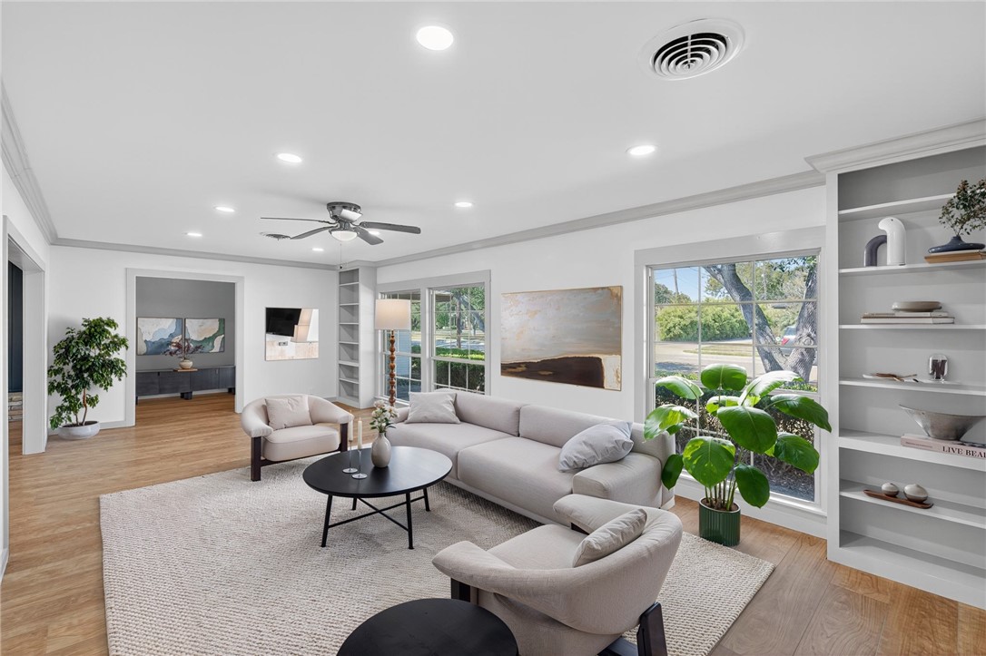 126 Rainbow Lane Corpus Christi, TX 78411 - Photo 5 of 40 a living room with furniture and a potted plant