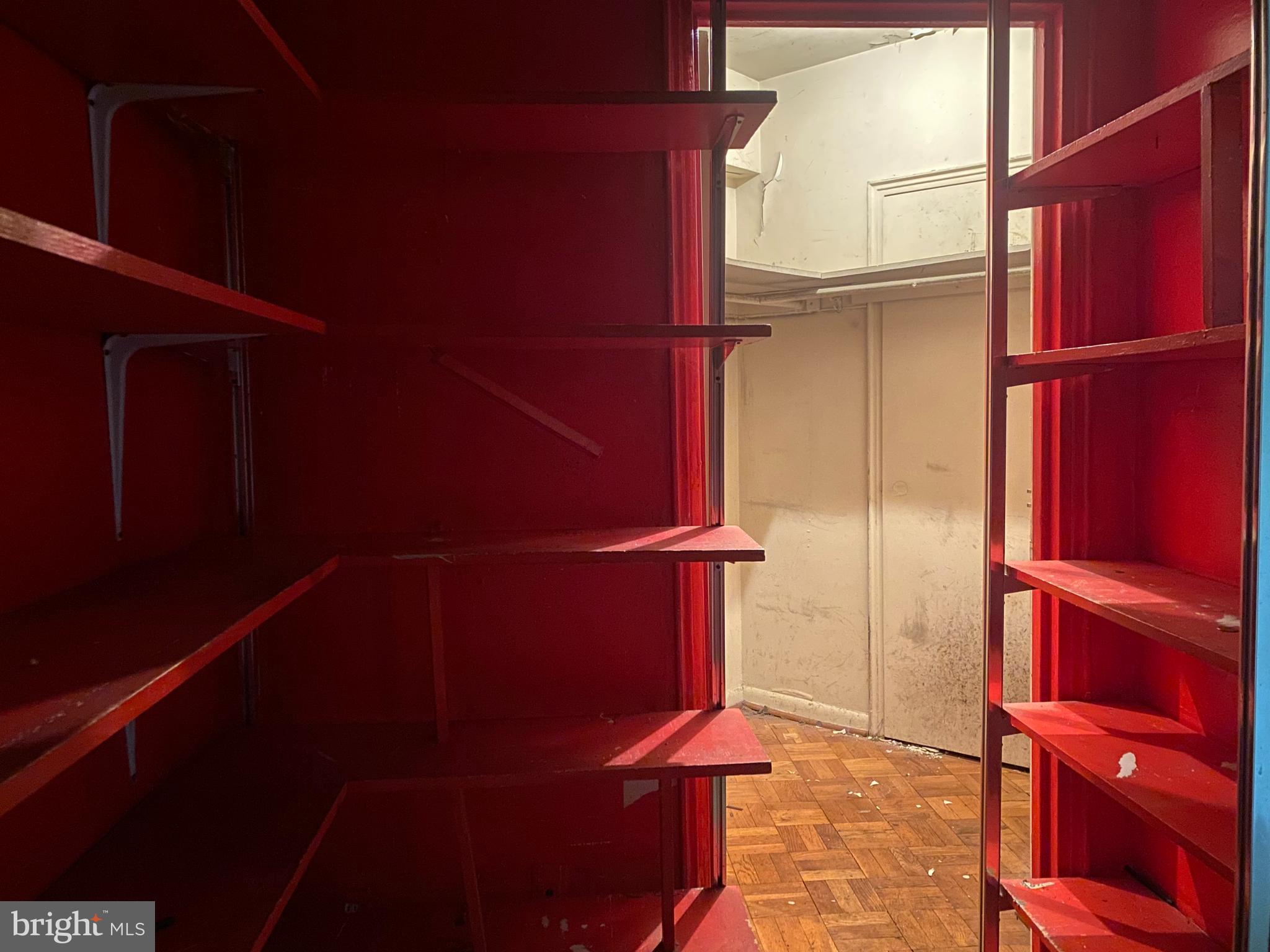 2500 Q Street Northwest, Unit 106 Washington, DC 20007 - Photo 6 of 12 Foyer and closet behind shelving