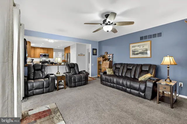 a view of a livingroom with furniture and a view of living room