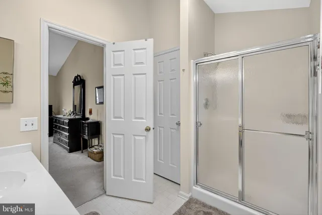 a view of a hallway view with staircase