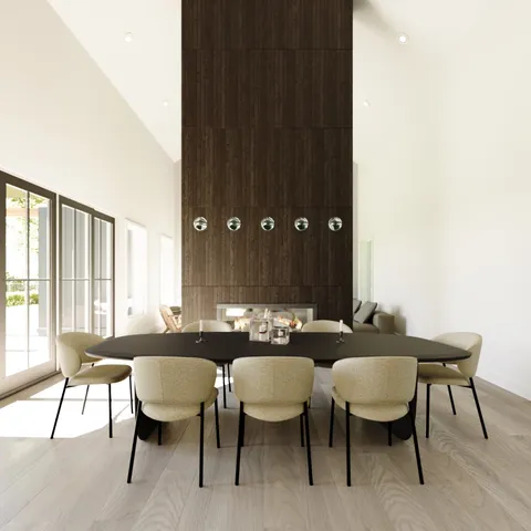 a view of a dining room with furniture and window