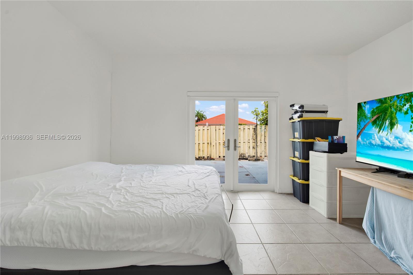 5510 Southwest 161st Place Miami, FL 33185 - Photo 12 of 28 a large white bed in a white room