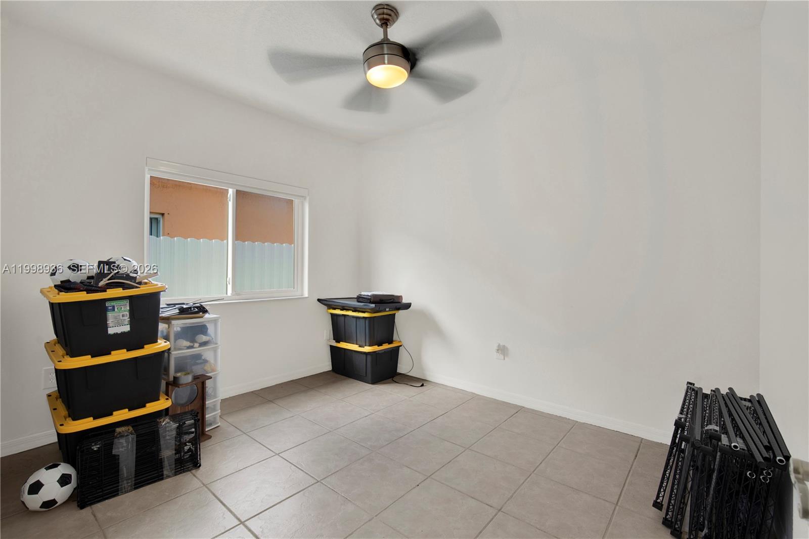 5510 Southwest 161st Place Miami, FL 33185 - Photo 19 of 28 a view of workspace with lounge chair