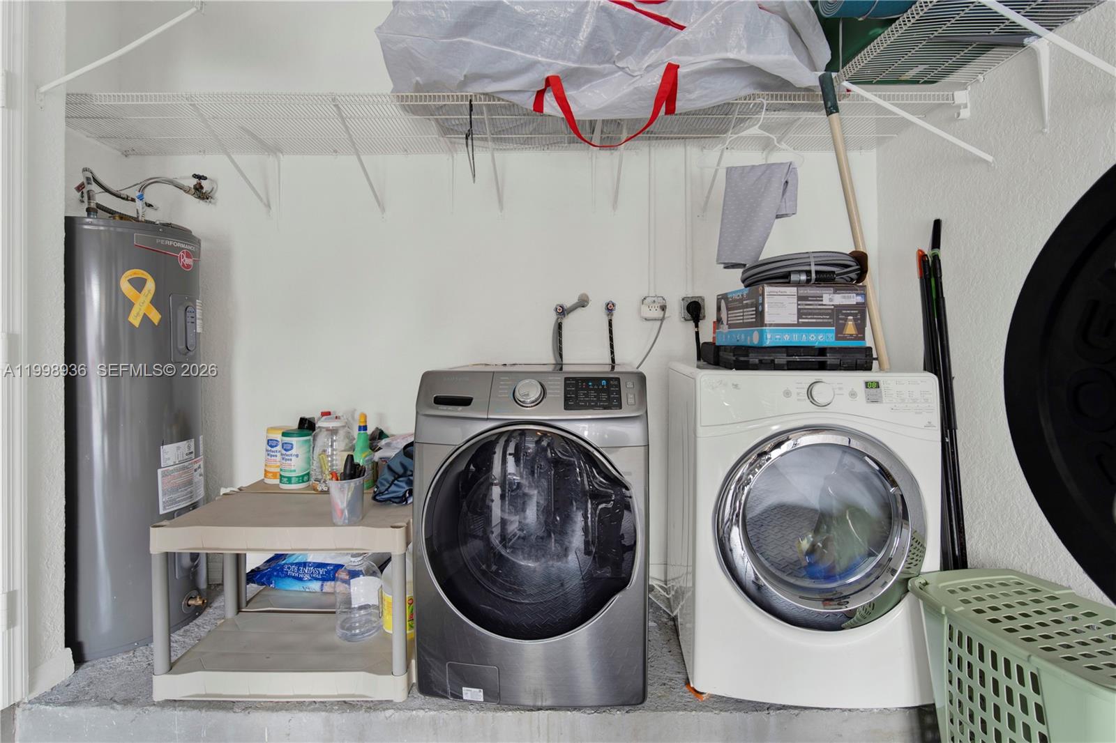 5510 Southwest 161st Place Miami, FL 33185 - Photo 20 of 28 a utility room with dryer and washer