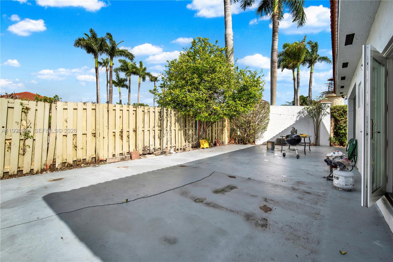 5510 Southwest 161st Place Miami, FL 33185 - Photo 24 of 28 a view of a street with potted plants