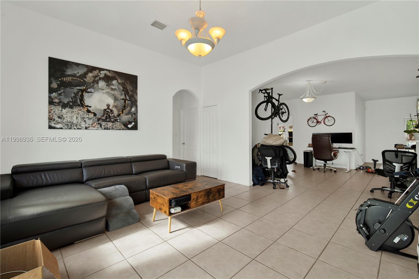 5510 Southwest 161st Place Miami, FL 33185 - Photo 4 of 28 a living room with furniture and wooden floor